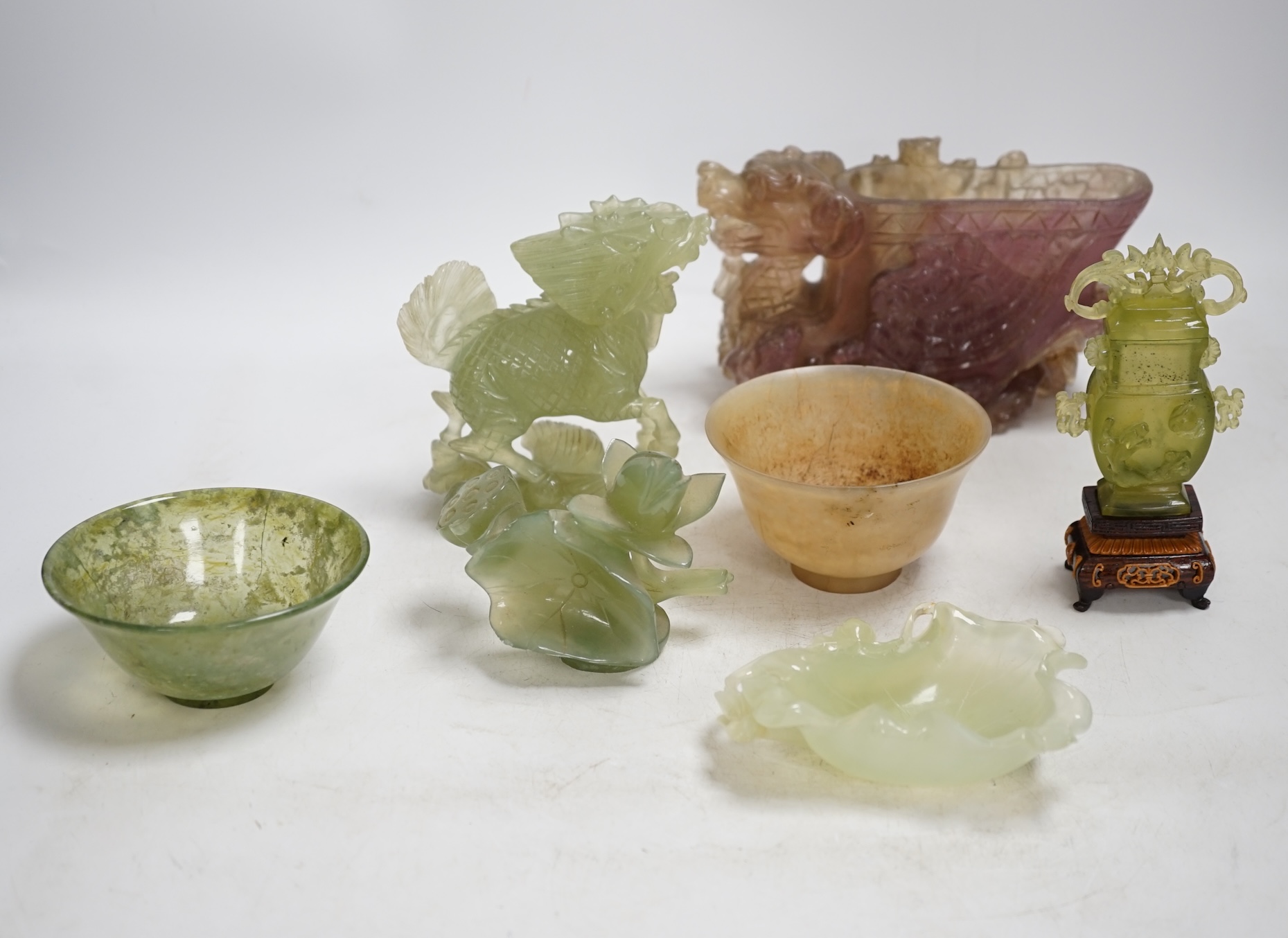 A group of seven Chinese hardstone carvings and vessels, tallest 12cm. Condition - poor to fair